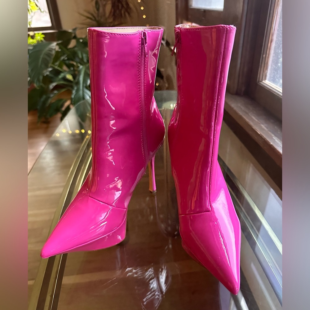 Pink stiletto platform point toe heel booties